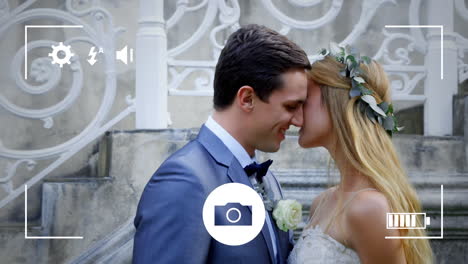 fotografieren von braut und bräutigam mit einer digitalkamera