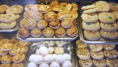 variety of cookies and pastries in a display case