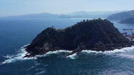 Historic-lighthouse-on-Mouse-Island-in-Getaria-of-Basque-Spain-coast