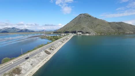 aerial view of a mountain lake and dam