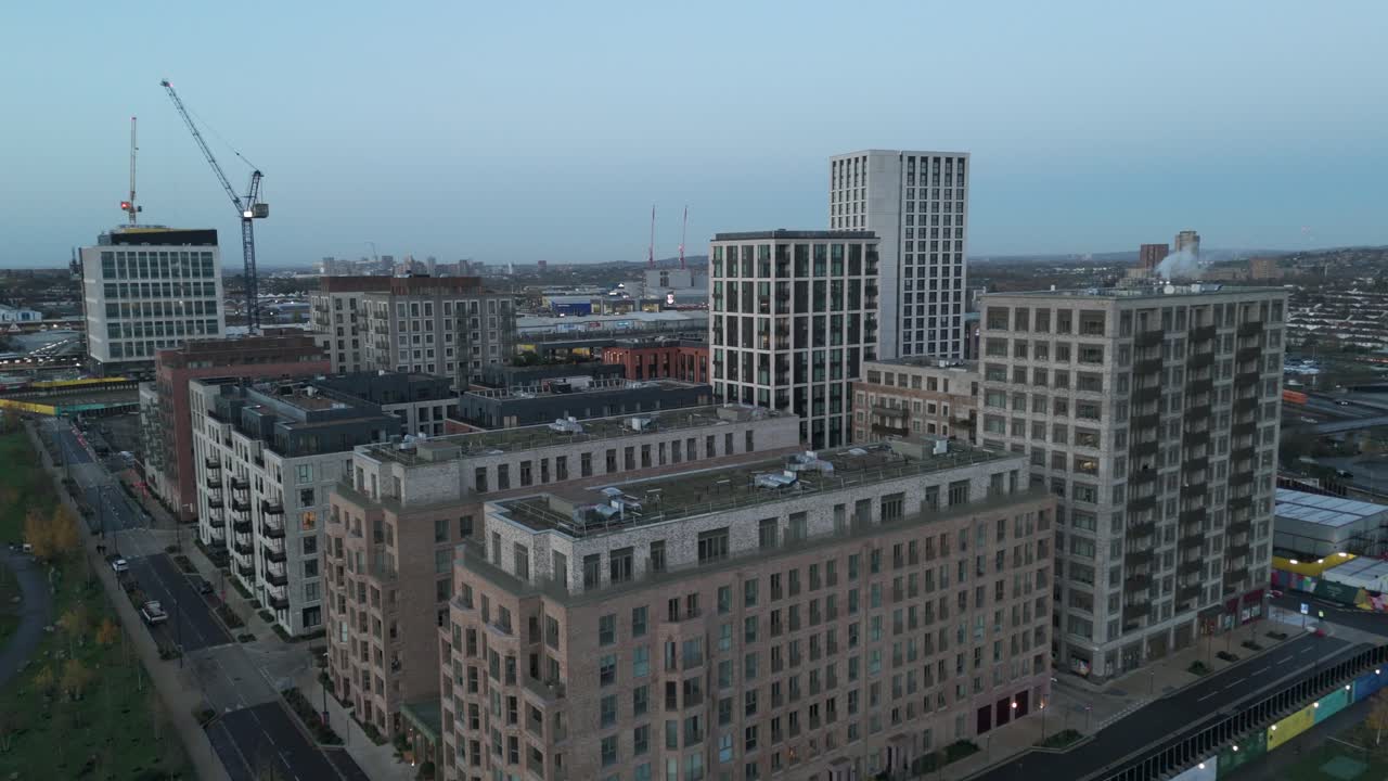 Wide angle drone shot new apartment housing development in urban British city