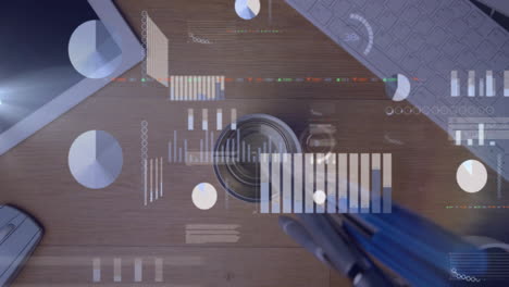 animation of digital data processing over calculator and tablet and computer on desk