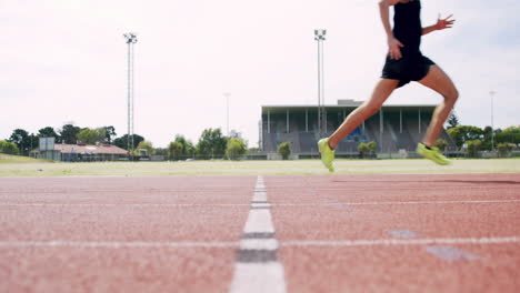 athlete running on the running track