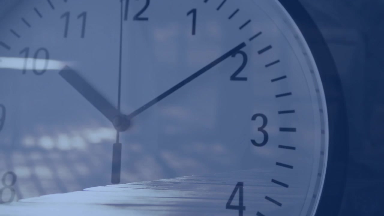 Analog clock showing hands advancing by clockwork, sea overlay and glints marking time for design