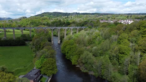 aerial view pontcysyllte aqueduct and river dee canal narrow boat bride in chirk welsh valley countryside