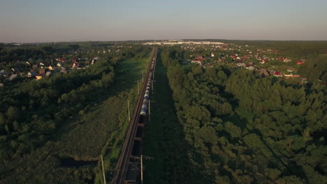 train running in the village aerial view