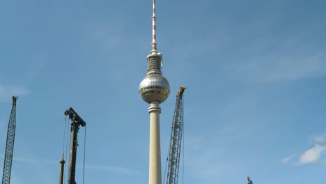 Construction-In-Berlin,-Berliner-Fernsehturm-Building-In-The-Background