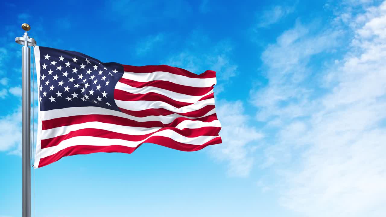 The national flag of the United States of America waving in the wind.