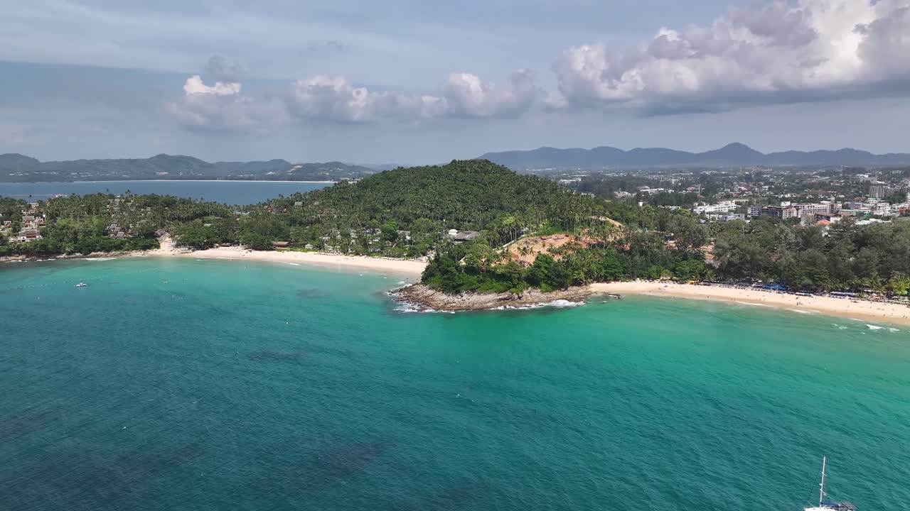 Beautiful sandy beaches on Phuket Island coastal, popular family holiday destination in Thailand.