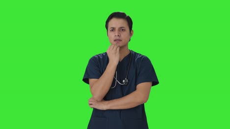 Médico-Indio-Confundido-Pensando-En-Algo-Pantalla-Verde