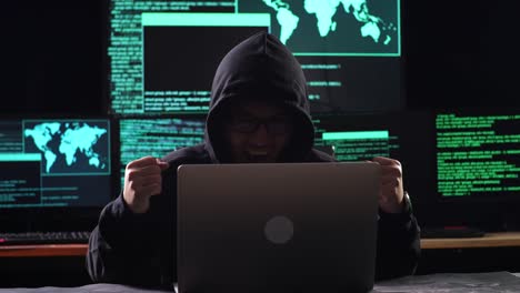 Excited Hacker Celebrating a Successful Cyberattack