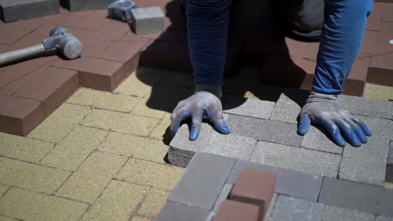 Laying pavers for a patio or driveway