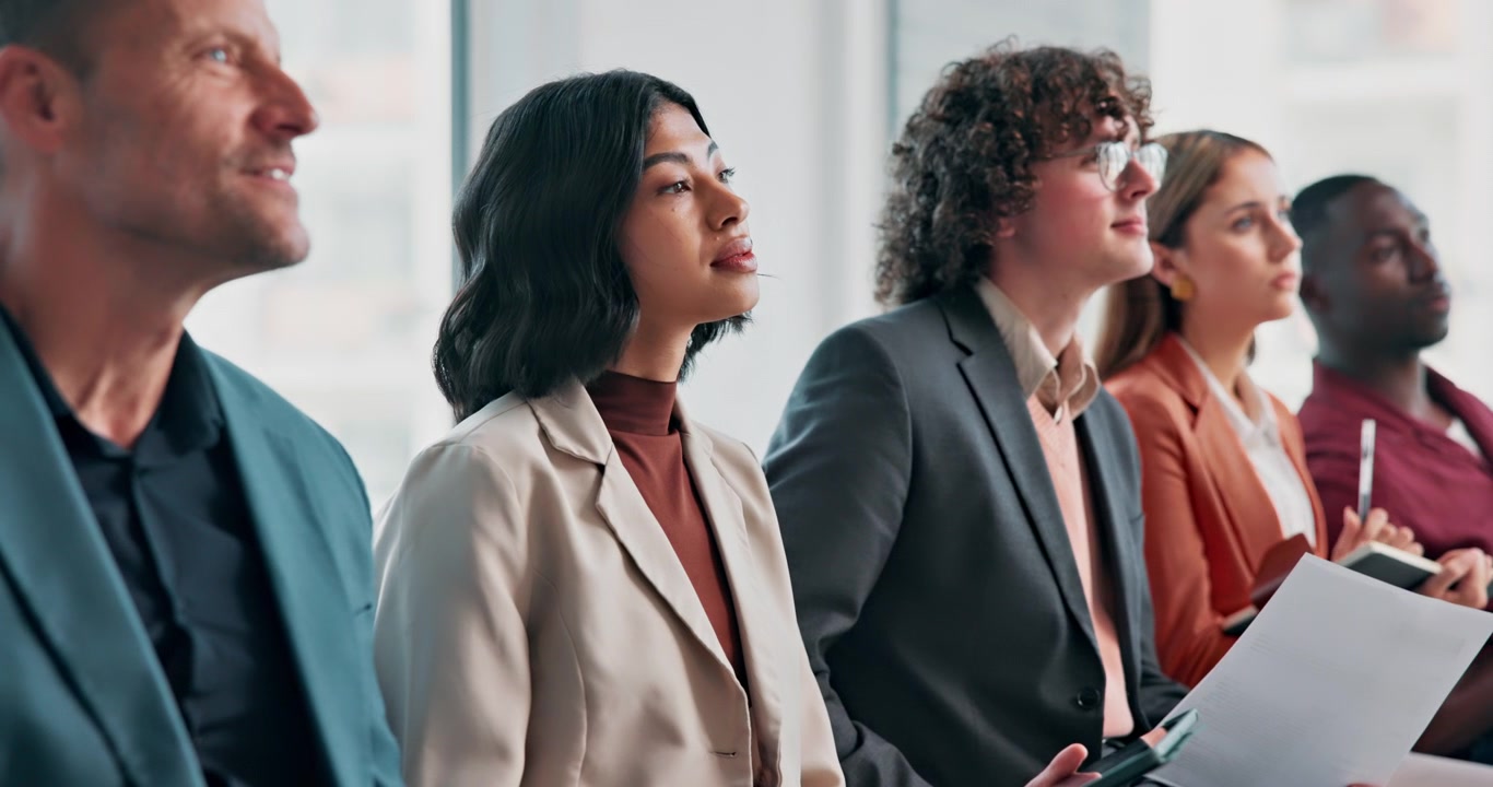 Diverse Group of Professionals Attending a Business Seminar