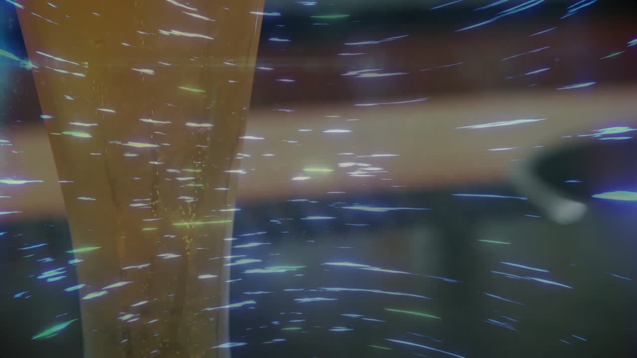 Abstract scene showing glowing light streaks moving across translucent amber column in 3D render