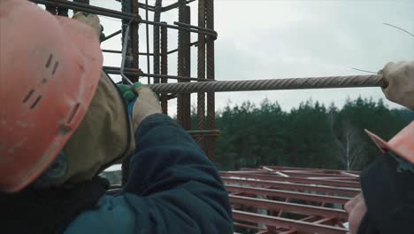 construction workers installing rebar