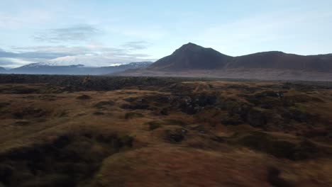 Flying-over-moss-at-sunset-in-Iceland