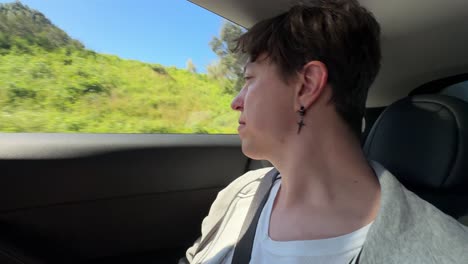 person sitting in a car