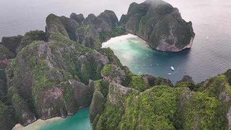 amazing magical view over the mist to maya bay, the beach location. world famous tourist spot.