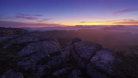 landscape at sunrise over some rocky mountains