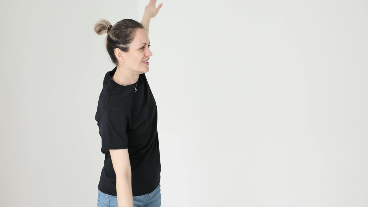 Woman stretching and exercising indoors