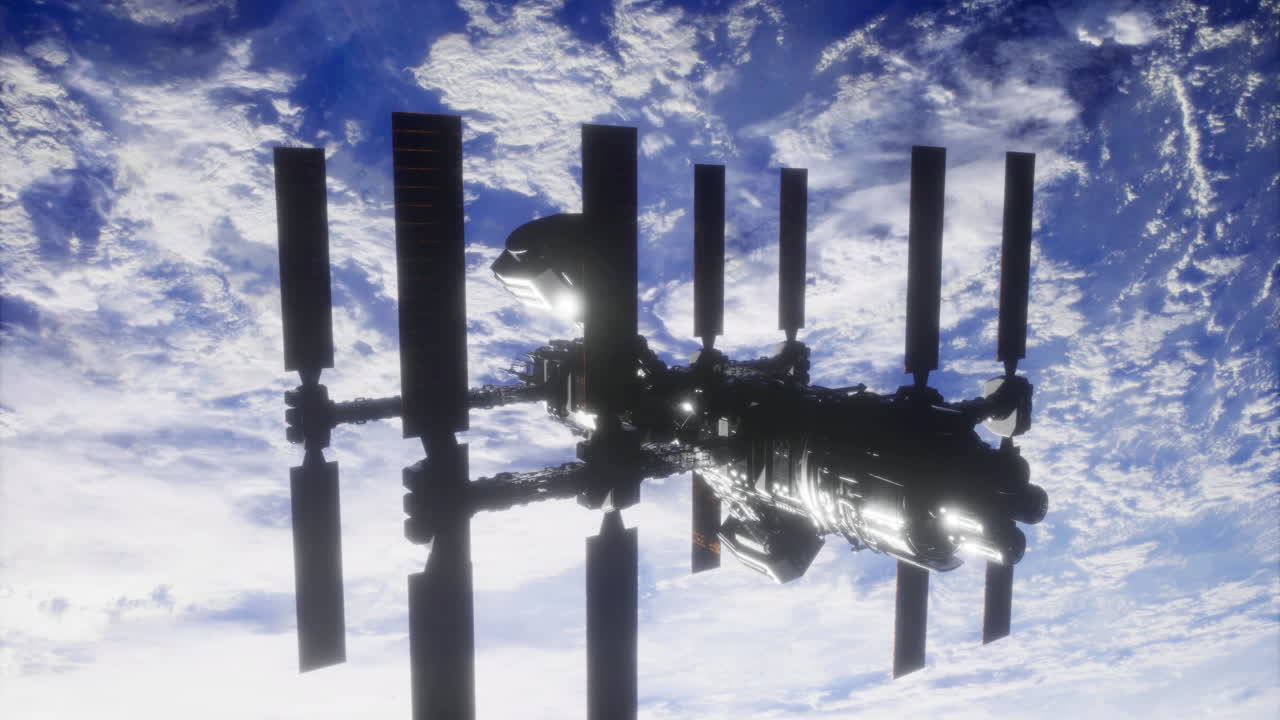 Space station orbits earth above a beautiful cloud layer during daylight