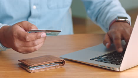 hands of businessman with credit card