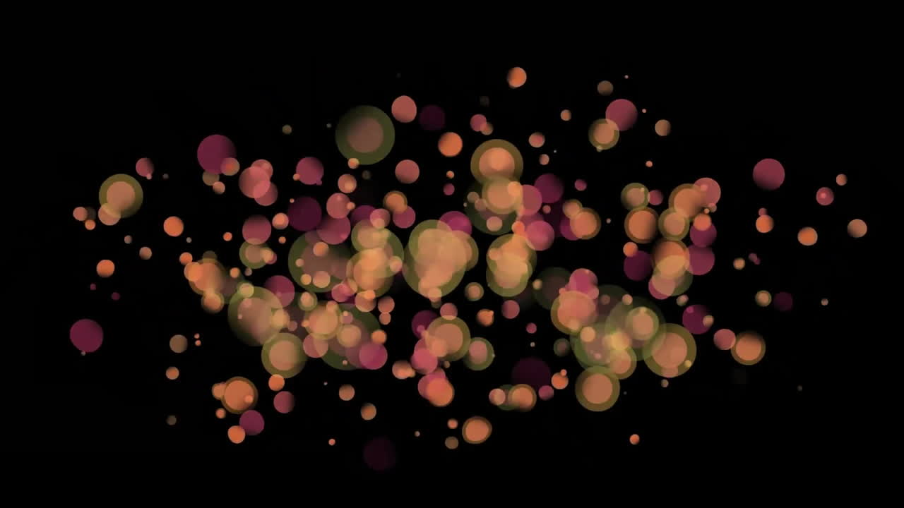 Animation of brown spots moving on black background