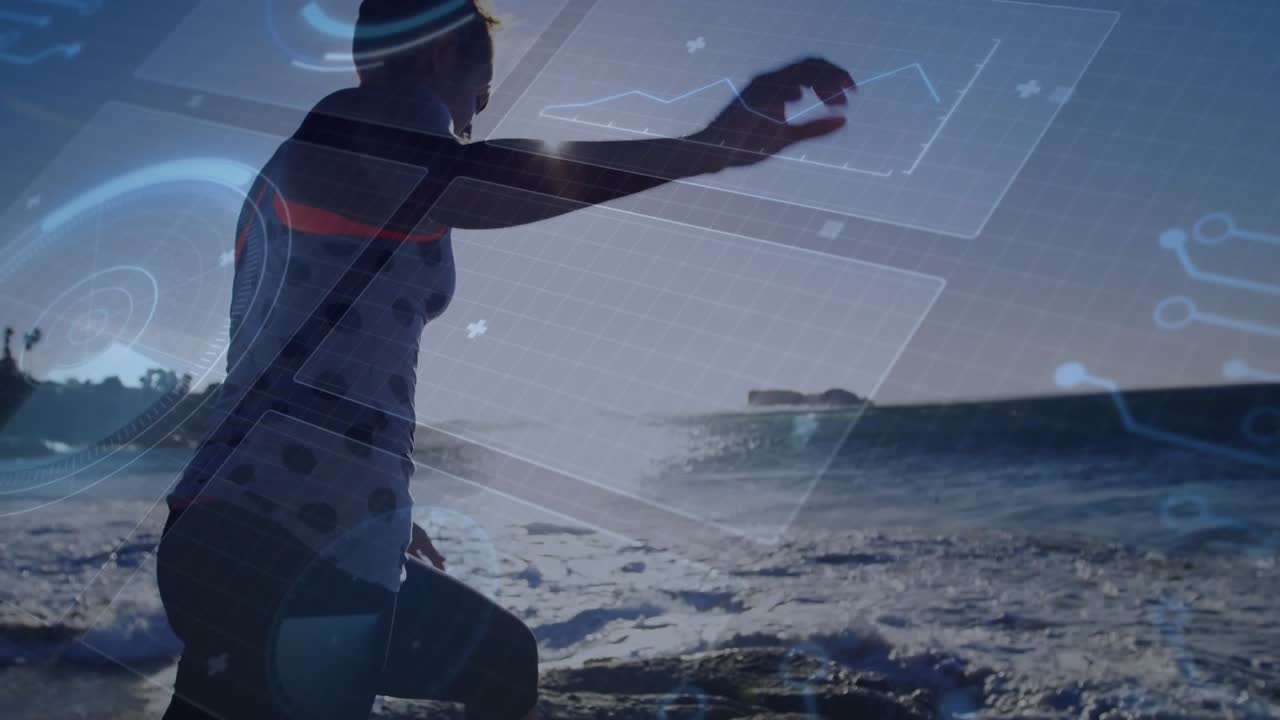 Female athlete stepping onto coastal rock and lunging, manipulating virtual charts and HUD overlays