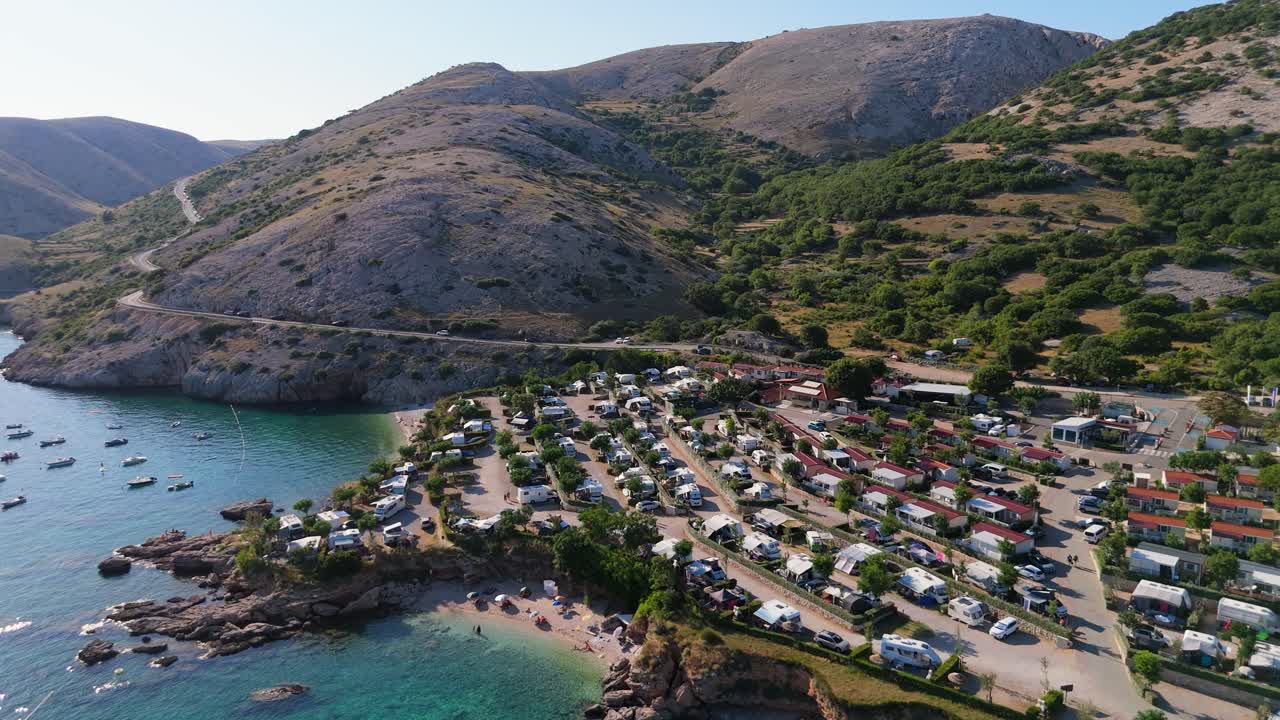 Campsite at Campig Skrila, Krk Island, Stara Baska Croatia, Aerial View of the Mountains and Coast With Boats, Beaches and Adriatic Sea. The Seaside Rv Campmobiles on a Summer Beautiful Coastline