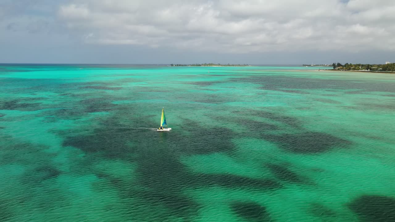 Nassau, Bahamas, Catamaran Sailing in Turquoise Tropical Sea Water, Drone Aerial View