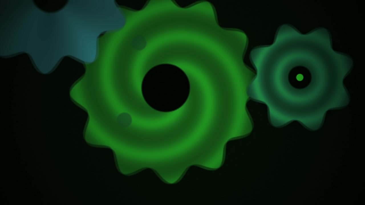 Abstract Animation of Green and Blue Gears Rotating on a Dark Background