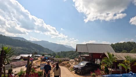 scenic view of a mountain village under blue skies