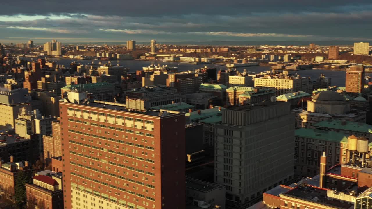 Fast drone pan of skyline over Morningside Park in Manhattan, New York City
