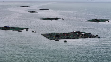 Fish-Breeding-Farms-in-the-Ocean-in-Southeast-Asia,-Aerial