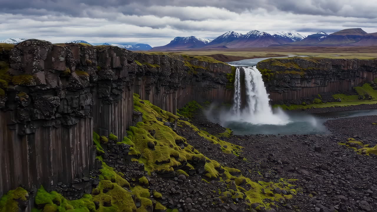 Icelandic Waterfall with Basalt Cliffs