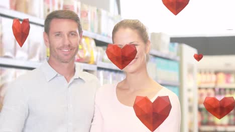 animación de iconos de corazones cayendo sobre una pareja caucásica en la tienda