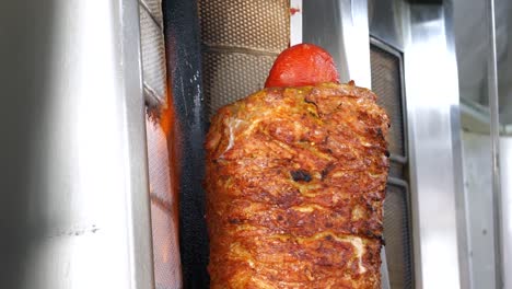 street food, chicken and beef meat roasted in a kebab grill