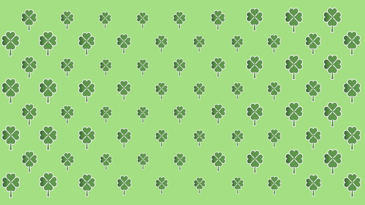 animación digital de múltiples hojas de trébol moviéndose contra un fondo verde