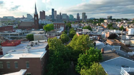 rising aerial reveal of baltimore md skyline