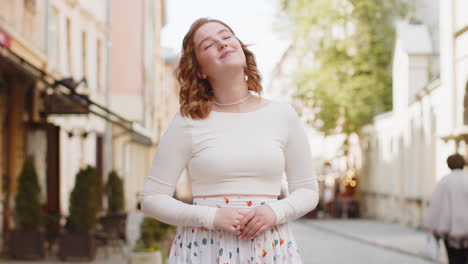 thoughtful smiling woman with pensive expression pondering a solution thinking inspiration dreaming