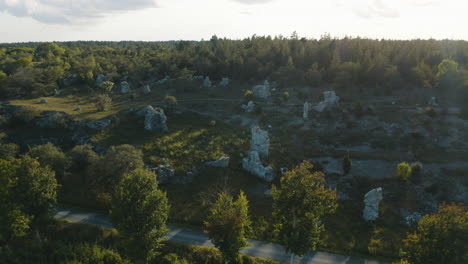 aerial shot over a collection of rauk stones on gotland, sweden