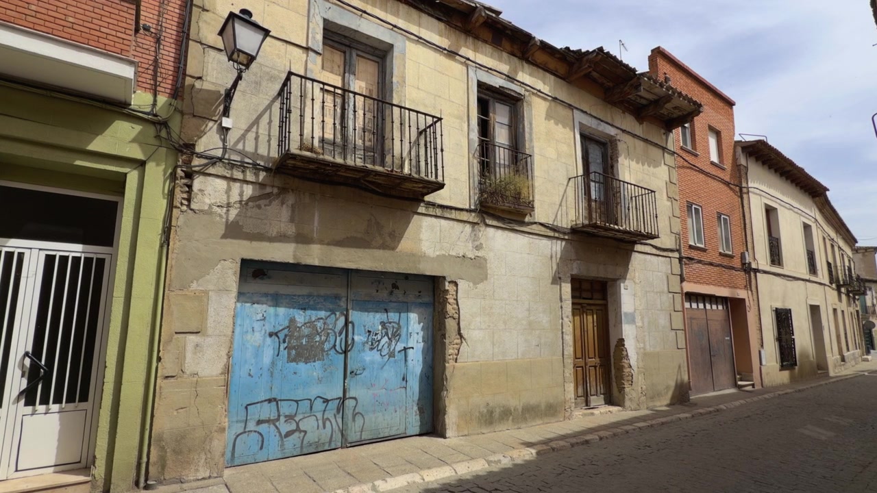 Abandoned deteriorated house in rural area representing economic decline rural depopulation housing crisis and neglected property.