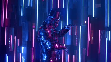 A-man-dances-in-neon-light-in-a-glass-suit.-Shiny-sparkling-silver-suit-and-blue-purple-neon-light.-New-year-party