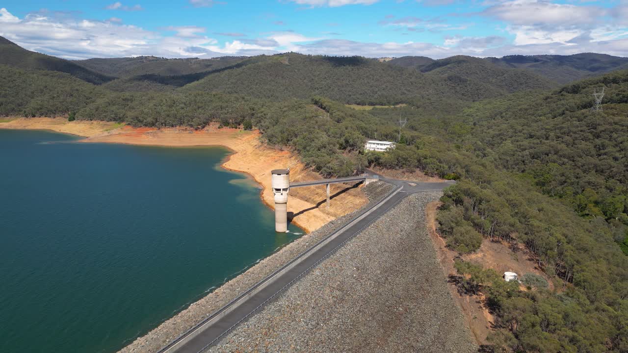 Reversing aerial views over the Blowering Dam and Reservoir, New South Wales alpine region.