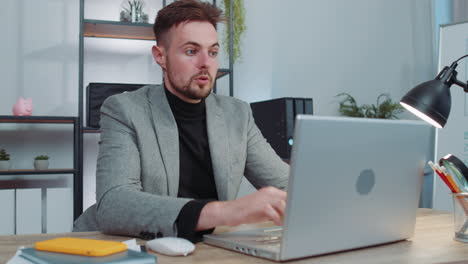 happy amazed businessman shocked by sudden victory, game winning, lottery goal achievemen, good news