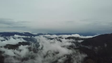 aerial view morning mist fog over los angeles neighborhood over clouds showing mountains in the di aerial view morning mist fog over los angeles neighborhood over clouds showing mountains in the distance