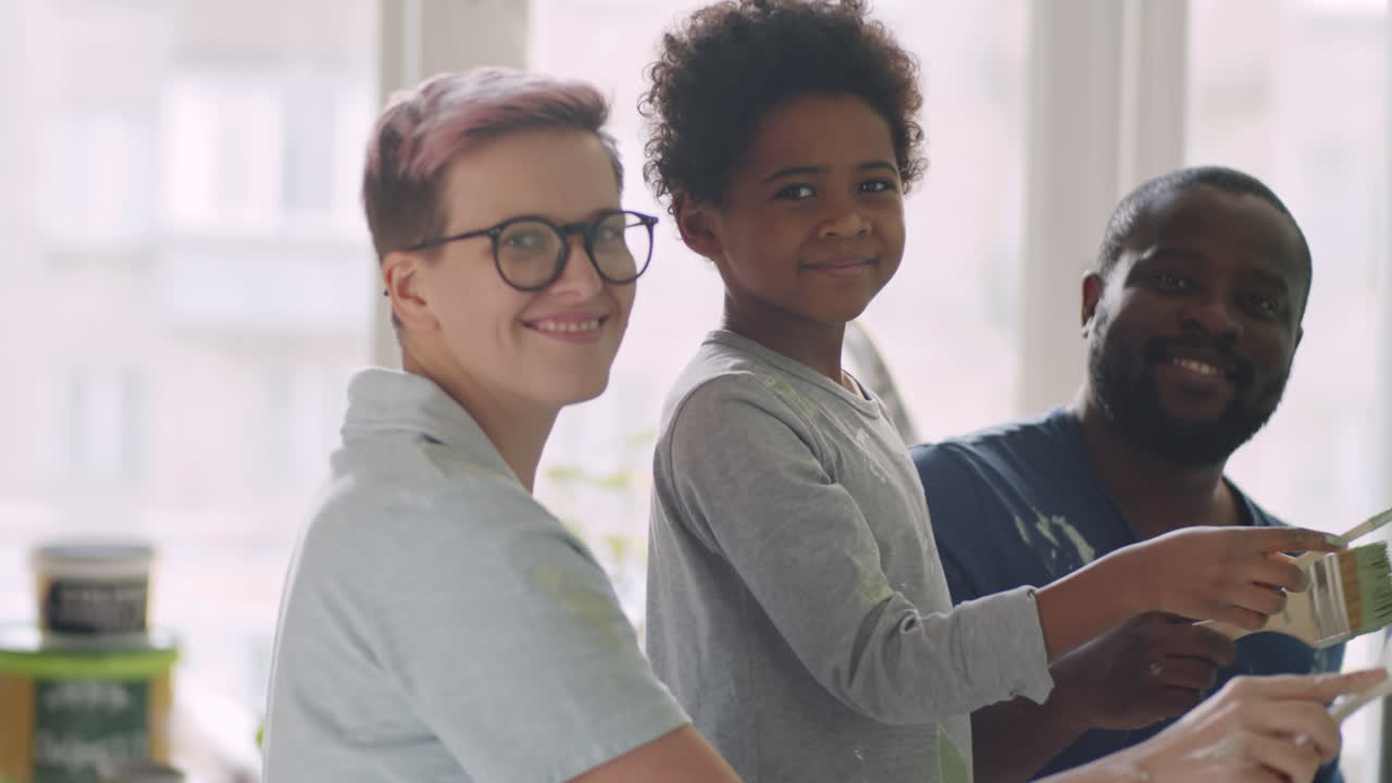 Family Painting a Wall