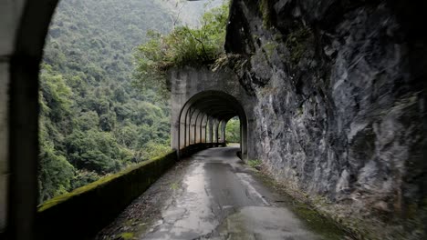 Impressive-Tunnel-Fly-Through-Mountainous-Road-Construction-Taiwan-Old-Unfinished-Provincial-Highway-14-along-the-Mugu-River-Mini-Taroko