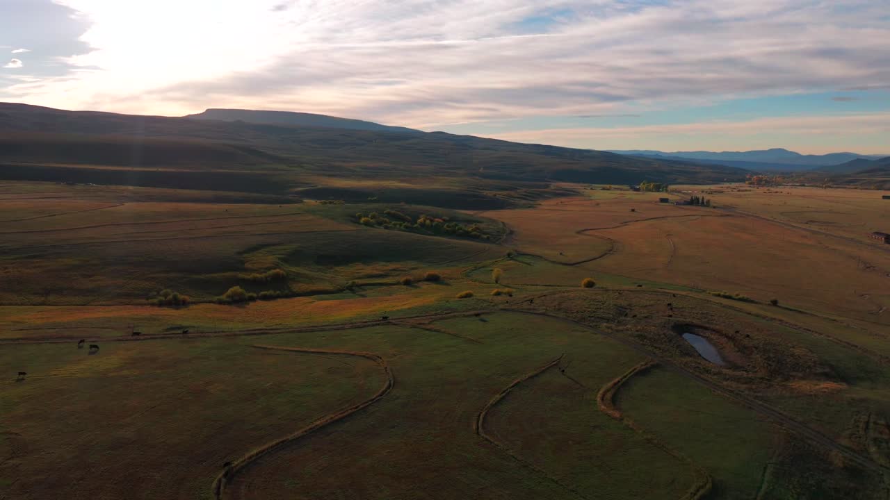 Gunnison National Forest Crested Butte Ohio Pass Swampy Pass Kebler Pass fall autumn Colorado aerial drone Elk Range Rocky Mountains Beaver Ponds morning bluesky sunny yellow Aspens trees backwards