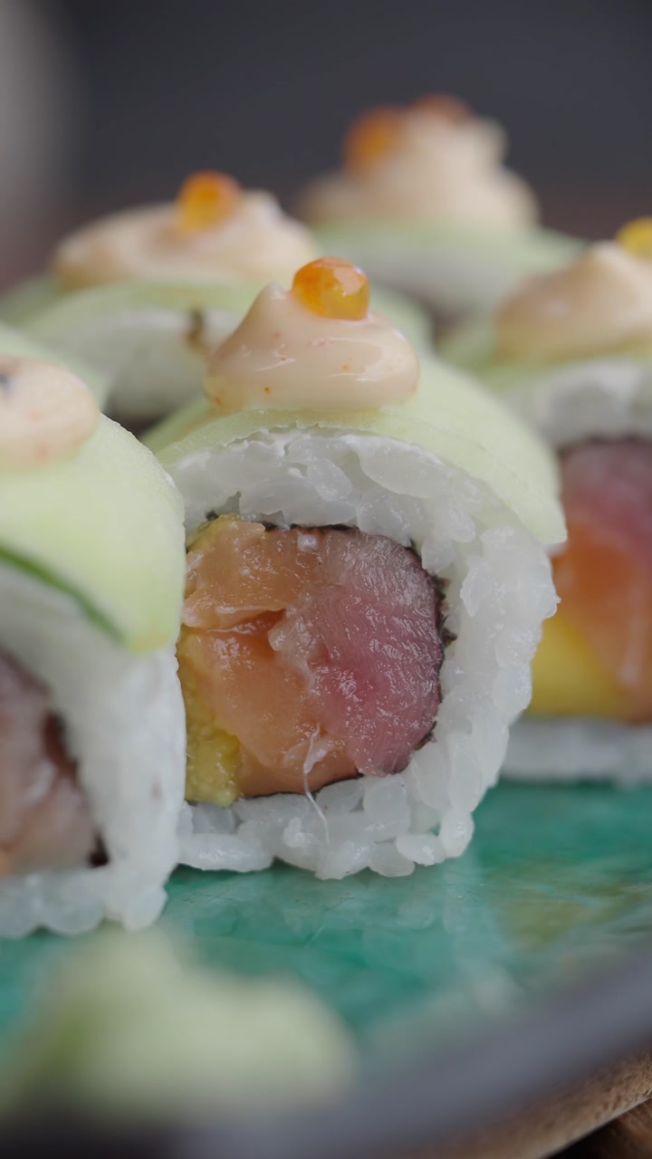 Gourmet Uramaki Sushi Rolls with Tuna, Salmon, and Tobiko